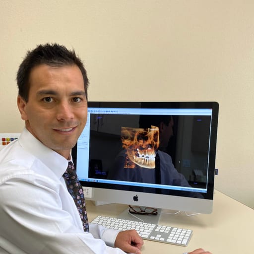 Brady Okuda, DMD